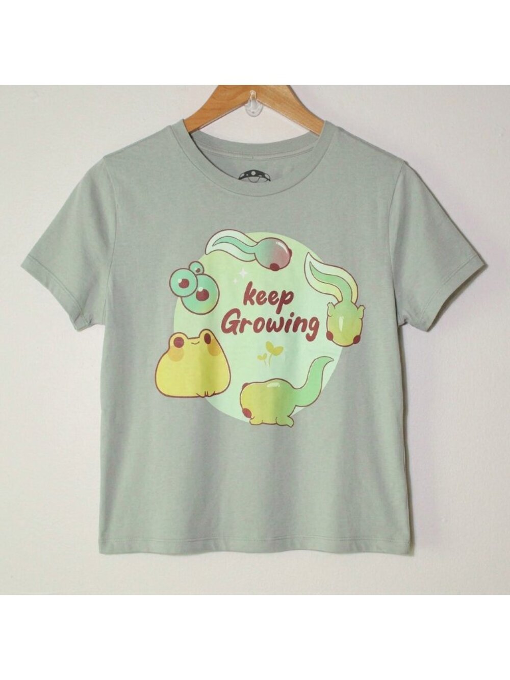 Spencer's Rihnlin Keep Growing Tadpole Frog Graphic Baby Crop Tee Sage Green L